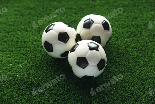 Preview: Soccer ball on the football field.