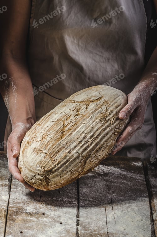Preview: Homemade bread from young woman chef