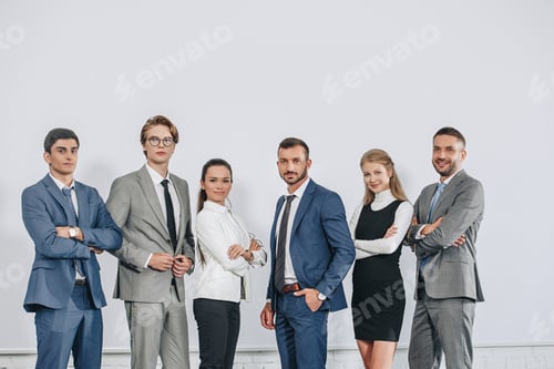 Preview: businesspeople posing near board after training in hub