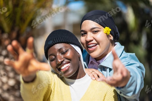 Preview: Teenager gen z muslim friends having fun in sunny spring day