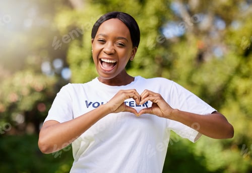 Preview: Heart, hands and portrait of volunteer woman with sign for care, support and charity outdoor in nat