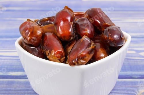 Preview: Heap of dates as source natural vitamins, minerals and dietary fiber, healthy nutrition