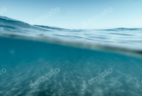 Preview: Split View Half Over and Under Ocean Surface whit Clear Sky. Background Concept