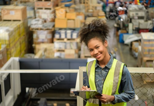 Preview: Female warehouse worker Counting items in an industrial warehouse