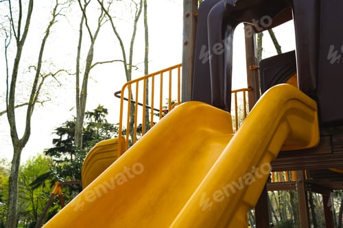 Preview: Colorful playground for children with slide close up