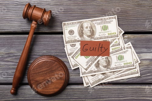 Preview: United States dollars and wooden gavel.