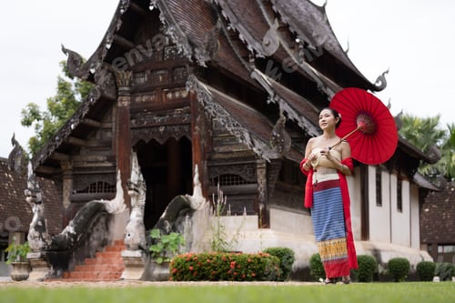 Preview: thai traditional woman in traditional dress in temple