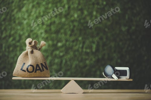 Preview: money bag with loan inscription and car key balancing on seesaw on green background