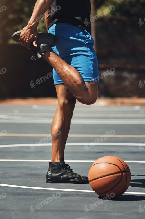 Preview: Fitness, basketball and man stretching legs on outdoor court for muscle preparation with workout. M