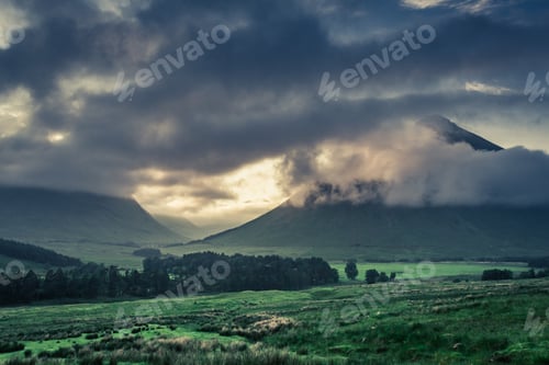 Preview: Before sunrise over the foggy mountains of Glencoe, Scotland
