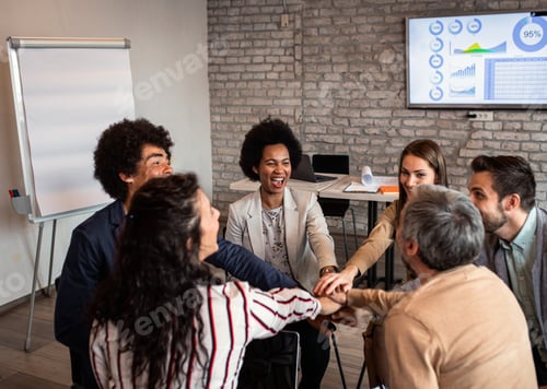 Preview: Group of diverse group of business people having a meeting while sitting in circle.