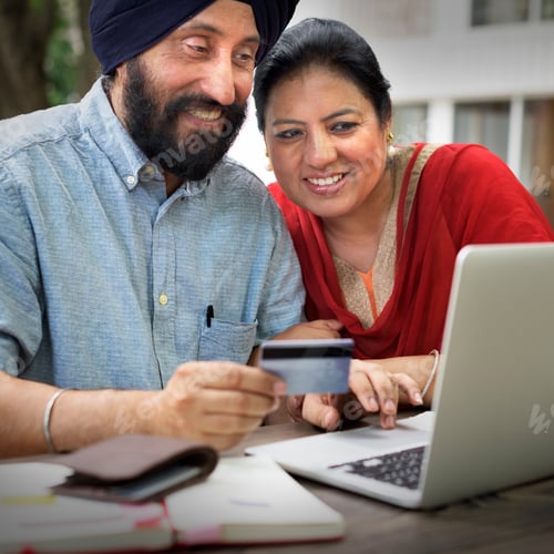 Preview: Indian Couple Using Device Concept