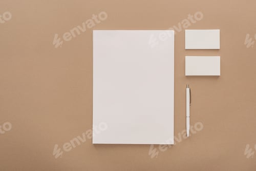 Preview: Top view of empty sheet of paper, cards and pen