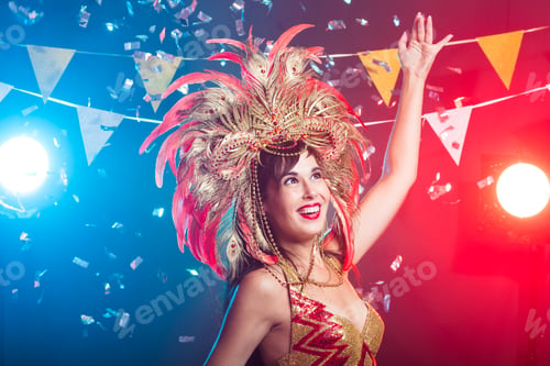 Preview: Carnival, dancer and holiday concept - Beauty brunette woman in cabaret suit and headdress with