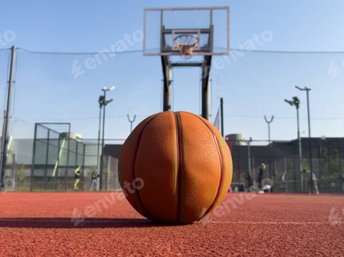 Preview: Basketball ball on a public playing court