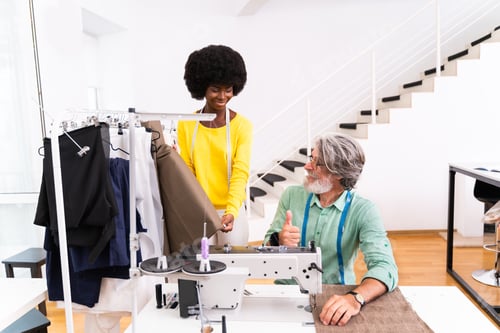 Preview: Team of fashion designers at work