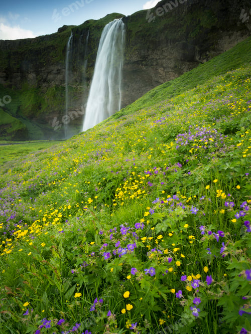 Preview: A waterfall cascade over a sheer cliff.