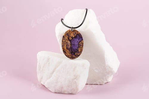 Preview: Decoration handmade lilac pendant made of stabilized wood on a granite stone stand
