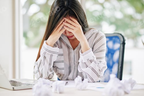 Preview: Stressed woman unable to write paper