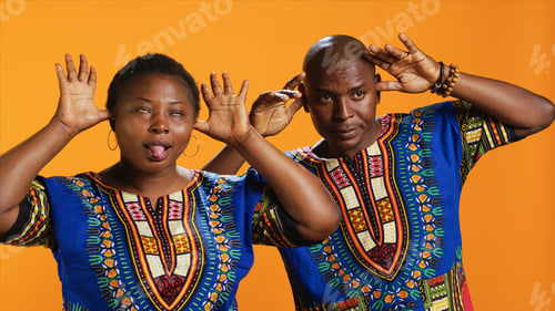 Preview: Silly ethnic couple fooling around on camera