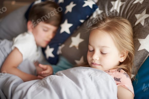 Preview: Siblings dreaming in their bed