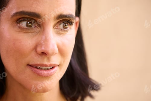 Preview: Close Up Beauty Portrait Of Smiling Mature Woman Against Natural Background