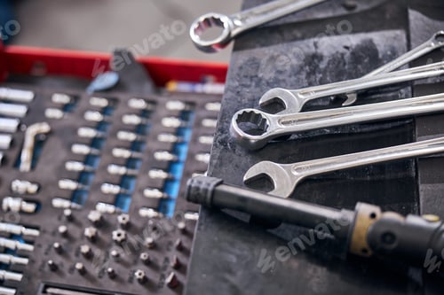 Preview: Auto repair kit and wrenches at car service station