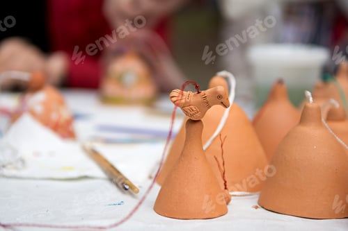 Preview: Handmade sale of clay bells and whistles.