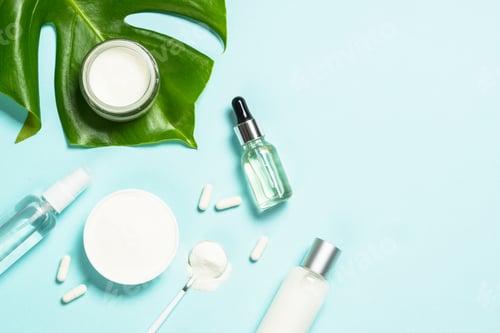Preview: Collagen products and cosmetic at blue top view