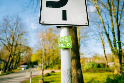 Preview: Bicycle line road sign in the park.