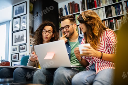Preview: Group of college students studying in the school library