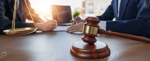 Preview: Businessman and lawyer discussing business contract document for legal advice in lawyer's office.