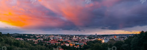 Preview: Vilnius, Lithuania. Sunset Dramatic Sky Above Historic Center Cityscape. Old Town Travel Panorama In