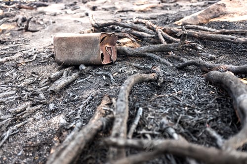 Preview: Can of burned gasoline found in the remains of a forest fire.