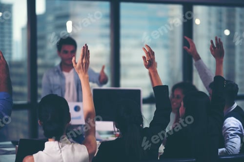 Preview: Successful team leader and business owner leading informal in-house business meeting