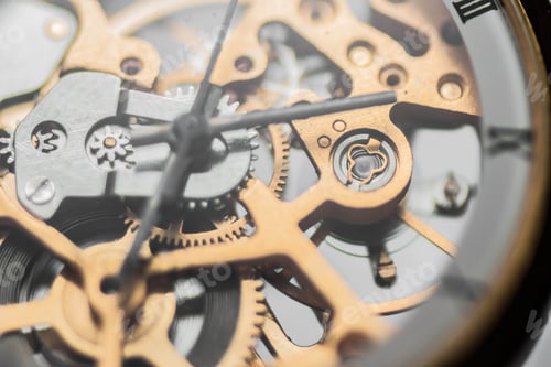 Preview: Closeup detail of the internal mechanism of a vintage analog clockwork