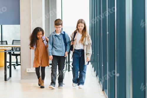 Preview: Portrait of kids standing in elementary school hallway