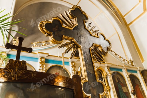 Preview: Huge Orthodox cross inside church. Faith tradition. Prayer tools and blessing items