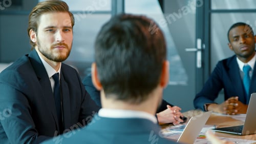Preview: Corporate business team in a meeting with a manager