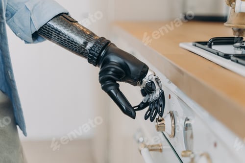 Preview: Disabled person with prosthetic arm uses gas stove, household appliance. Disability, domestic life