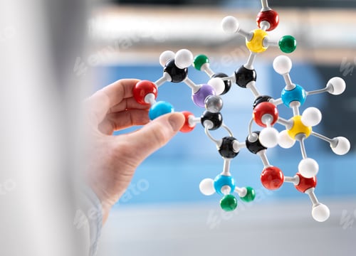 Preview: Scientist holding a molecular model