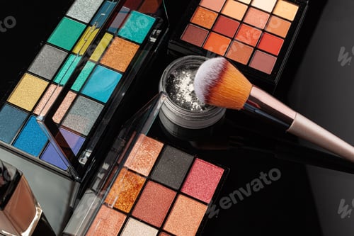 Preview: Professional makeup brushes and tools, make-up products set on dark table