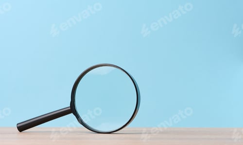 Preview: Black magnifier on a blue background. The concept of uncertainty and the search for solutions