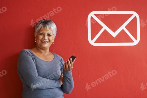 Preview: Shot of a mature woman holding a mobile phone with a message icon beside her on the wall