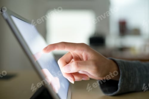 Preview: Woman touch on digital tablet