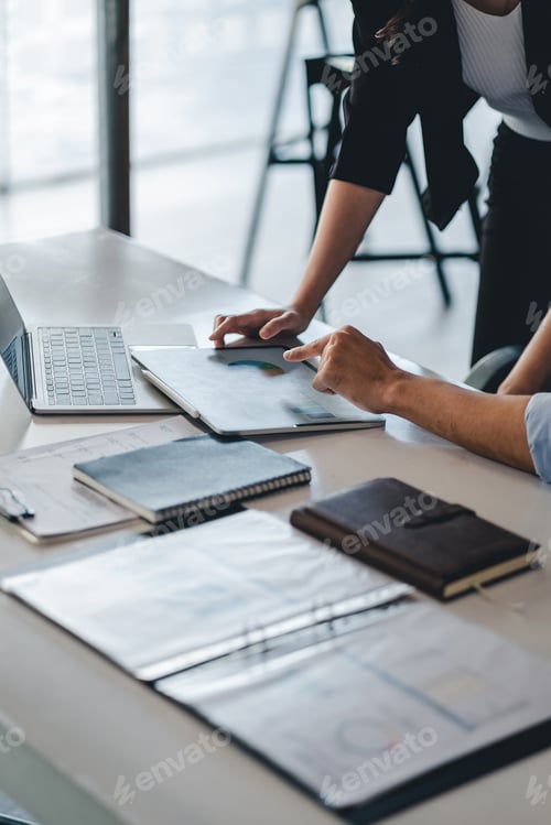 Preview: Business People Talking Discussing with coworker planning analyzing financial document data charts