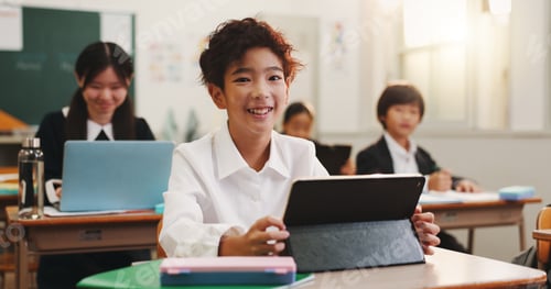 Preview: Tablet, portrait and japanese child in classroom with learning, education and youth knowledge at sc