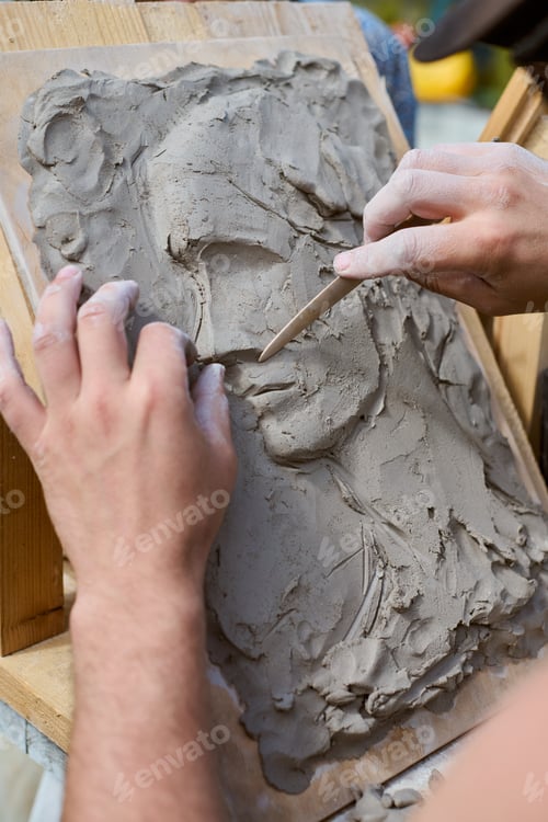 Preview: Creating clay relief portrait with wooden tools