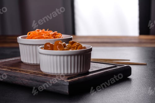 Preview: Homemade pickled honey agarics mushrooms in a white bowl