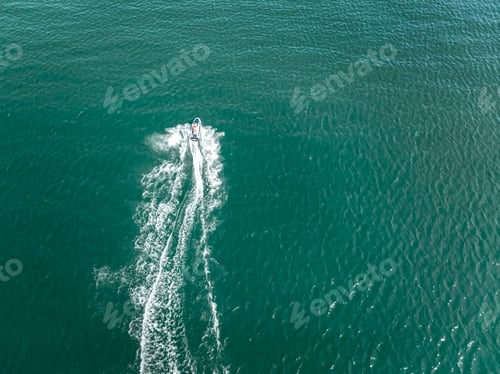 Preview: Man riding a jet ski on Baltic sea in summer.